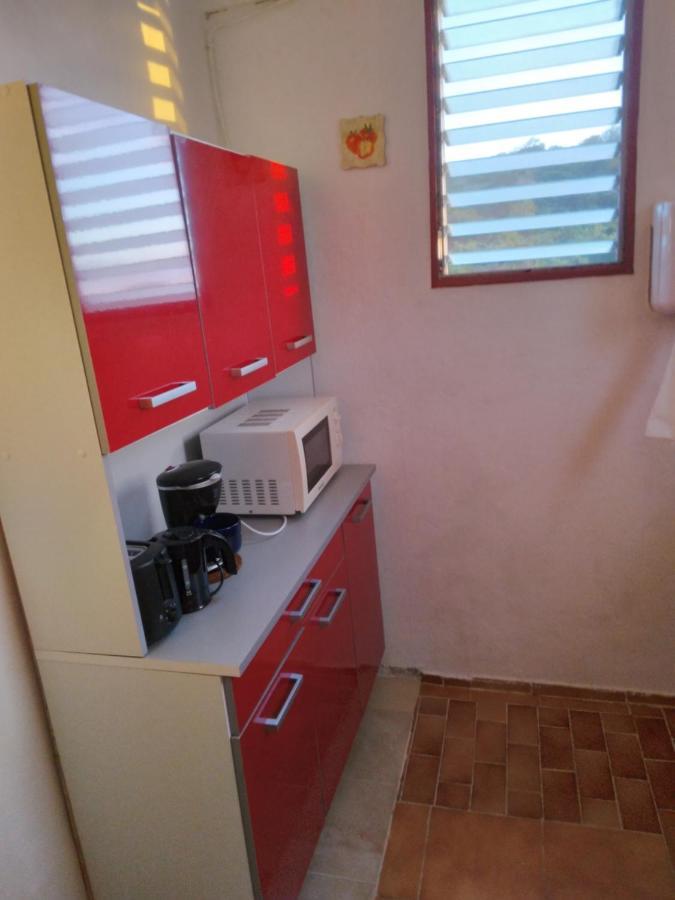 Apartamento Au Jardin Fleuri Sainte-Anne Exterior foto